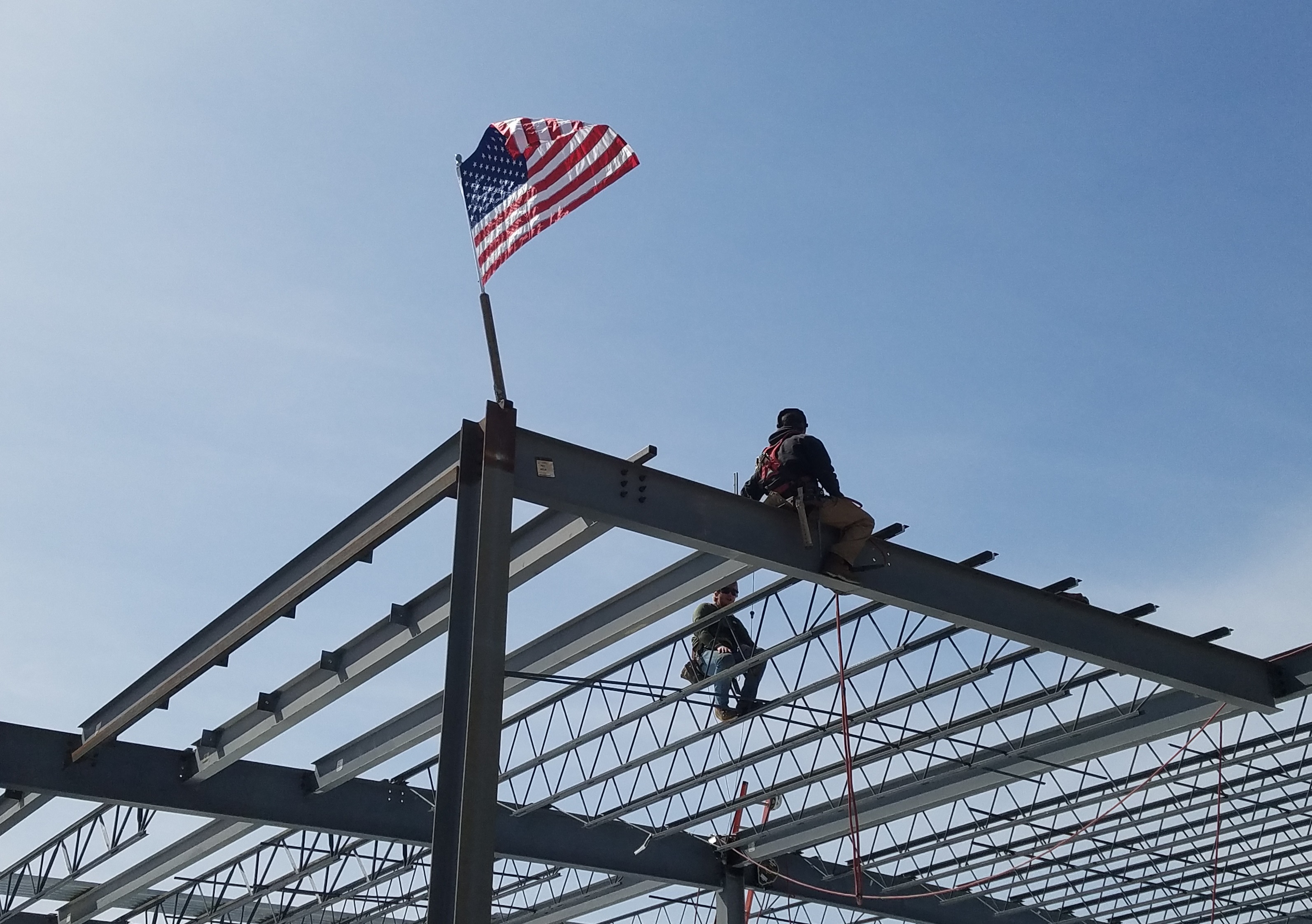 Flag topping off on steel beams